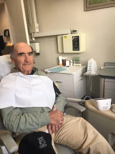 Patient in dental chair before treatment