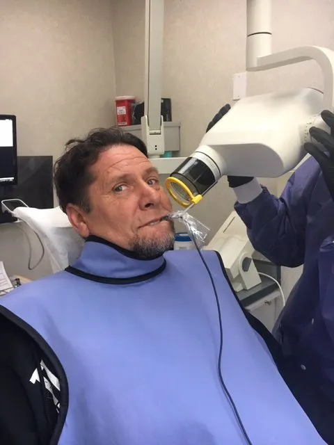 A patient receiving X-rays